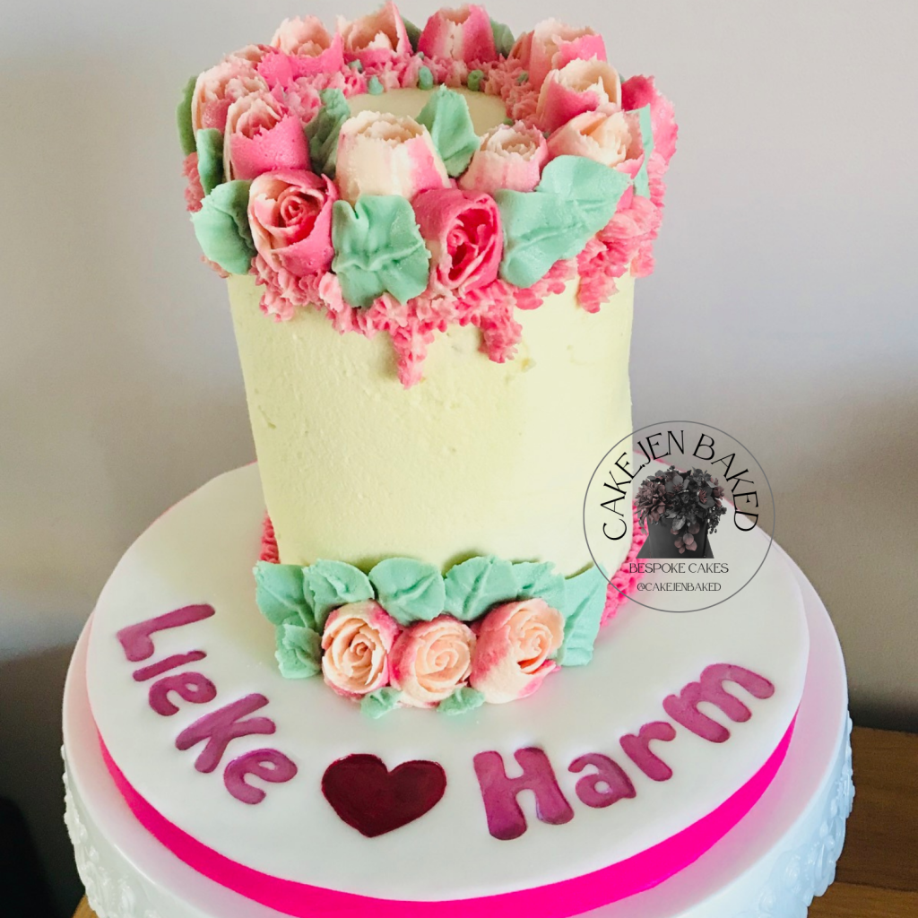 Buttercream engagement cake decorated with buttercream roses