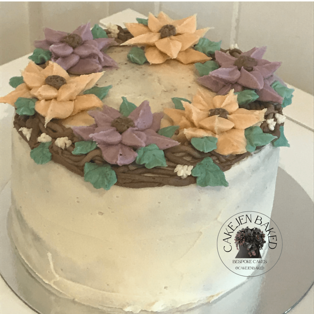 Chocolate sponge thank you cake and filled with chocolate buttercream. Decorated with buttercream flowers